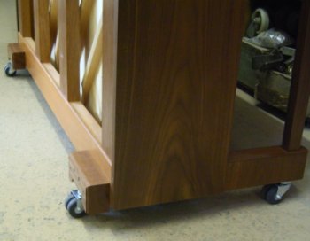 Kawai K2 upright piano with twin wheel castors and custom made back blocks