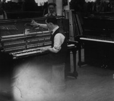 Inside the Brasted piano factory. Tuning.