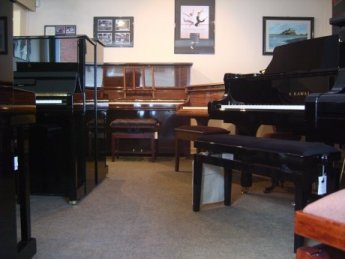 Inside Carstairs Pianos, Roper Road showroom.