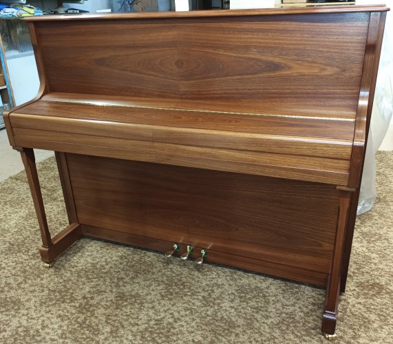 Ibach C116 upright piano in a satin mahogany finish.